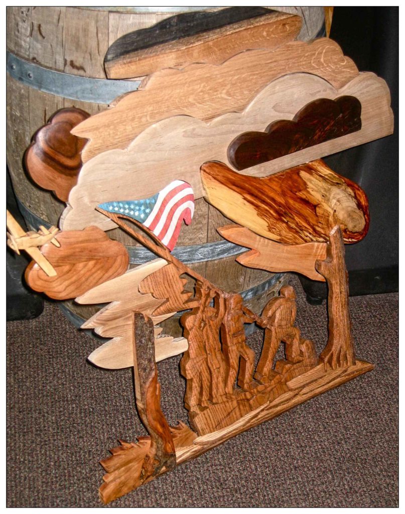 wood-carving-by-rick-kremer-flag-raising-american-flag